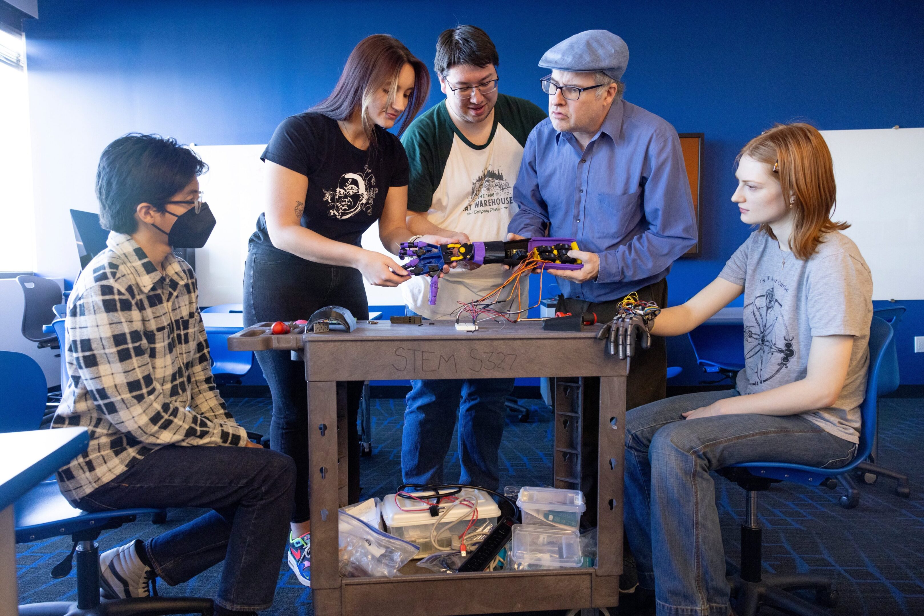 Four friends enjoying a board game night together.